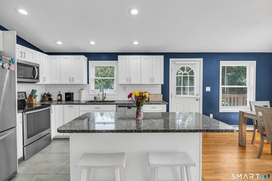Welcome home to this bright and inviting 3-bedroom, 2-full-bath - photo 21
