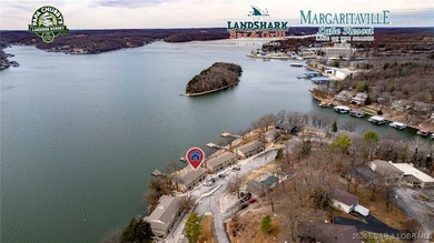 Front-row main channel views, multiple boat slips, and turnkey - photo 2