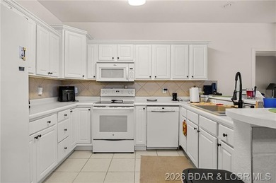 Enjoy peaceful lake living in this beautifully situated