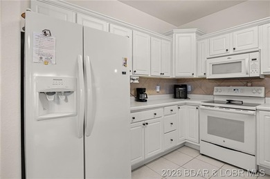 Enjoy peaceful lake living in this beautifully situated