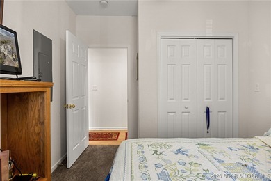 Enjoy peaceful lake living in this beautifully situated