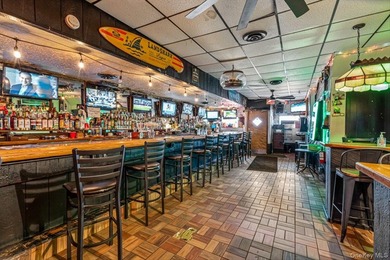 Welcome to The Dart Inn, a beloved neighborhood sports bar in - photo 11