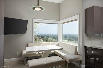 Perched in the hills of Panorama Heights in North Tustin, this - photo 17