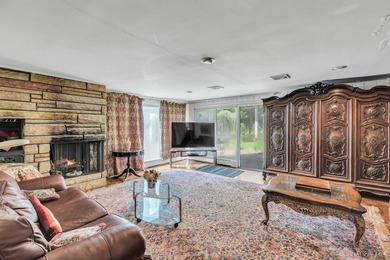 This Munsey Park brick split-level home is situated on a - photo 18