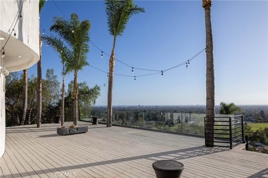 Perched in the hills of Panorama Heights in North Tustin, this - photo 46