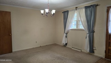 Welcome to this charming 3-bedroom, 2-bath home located in a