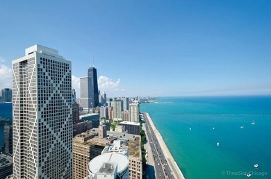 Walls of windows beautifully frame breathtaking views of Lake - photo 26