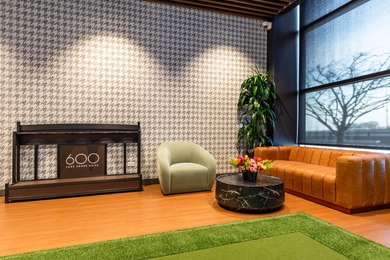 Walls of windows beautifully frame breathtaking views of Lake - photo 40