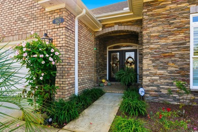 Come see this stunning *LAKE FRONT*custom built home located in