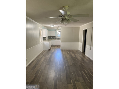 This beautiful, renovated duplex is located approximately 4 - photo 2