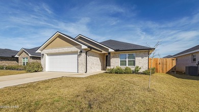 Move-in ready and packed with upgrades, this solid brick home - photo 3