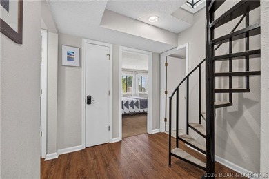 Top-floor condo living in the heart of Osage Beach! Located in - photo 12