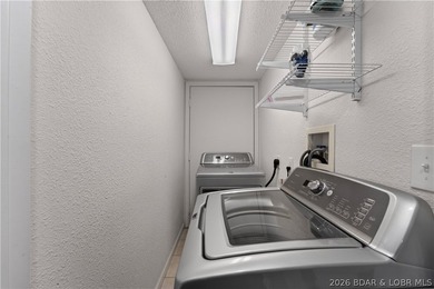 Top-floor condo living in the heart of Osage Beach! Located in - photo 13