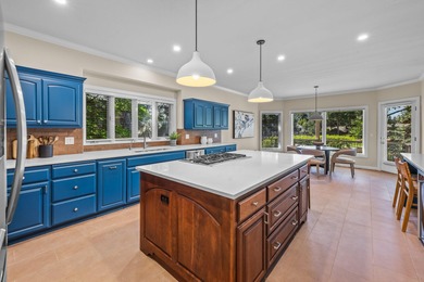 Picturesque lake and 17th-fairway views from this beautifully - photo 13
