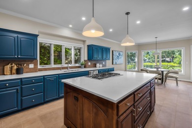 Picturesque lake and 17th-fairway views from this beautifully - photo 14