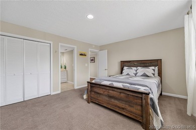 Top-floor condo living in the heart of Osage Beach! Located in - photo 19