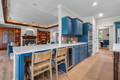 Picturesque lake and 17th-fairway views from this beautifully - photo 19
