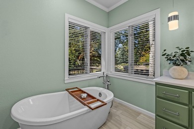 Picturesque lake and 17th-fairway views from this beautifully - photo 32