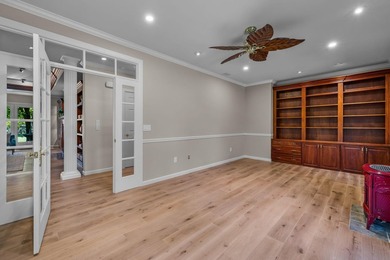 Picturesque lake and 17th-fairway views from this beautifully - photo 38