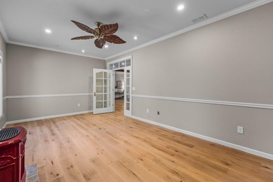Picturesque lake and 17th-fairway views from this beautifully - photo 41
