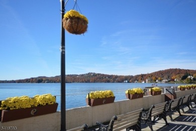 Lake Mohawk custom lake-style home set on .87 private acres with - photo 50