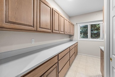Picturesque lake and 17th-fairway views from this beautifully - photo 50