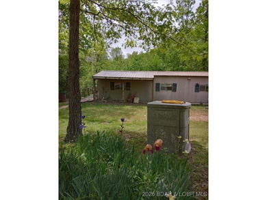 Two great lots with seasonal lake view to build your own home