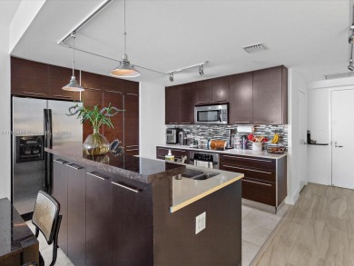 Just reduced! Quantum on the Bay is in an excellent Edgewater