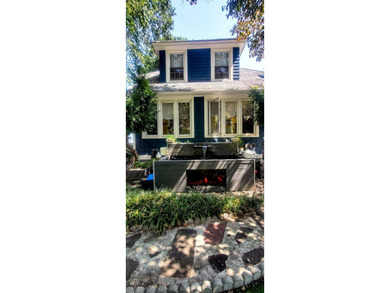 Crisp white architectural accents, blue paint & a white fence - photo 3