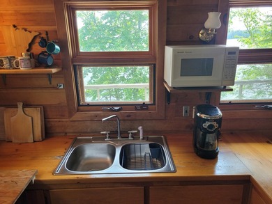 Rainy Lake. Amazingly charming 2 bedroom Keyes Island cabin on - photo 4