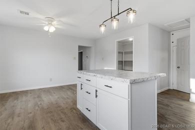 Beautiful FULLY remodeled 2 bedroom 2 bathroom 2nd tier lake - photo 6