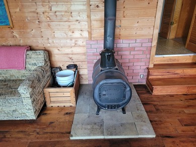 Rainy Lake. Amazingly charming 2 bedroom Keyes Island cabin on - photo 10