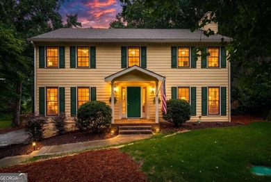 Welcome to this beautiful Colonial-style home nestled in a - photo 1