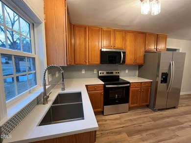 Adorable Ranch home just outside of Downtown Raleigh. Easy