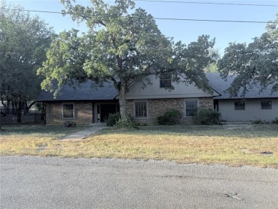 Lake Home For Sale in Runaway Bay, Texas