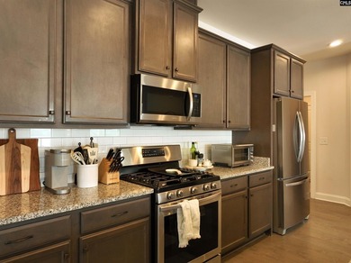 Welcome home to this beautiful all-brick ranch located in the - photo 14