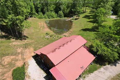 Nestled along the serene Elk River, Lazy K offers a rare - photo 6