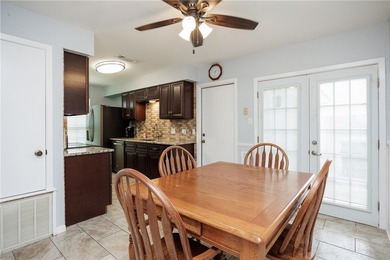 Welcome to this well-maintained one-story brick home located on - photo 11