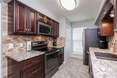 Welcome to this well-maintained one-story brick home located on - photo 15