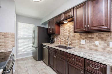Welcome to this well-maintained one-story brick home located on - photo 17