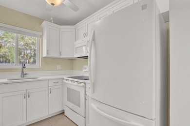Rare 1st floor 2 bedroom, 2 bathroom condo with in unit laundry - photo 19