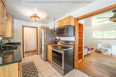 YOUR DREAM HOME SITTING ON A RIVER LOT IS HERE! This ranch-style - photo 8