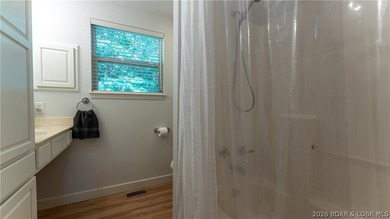Completely remodeled, fully furnished, and truly turnkey, this - photo 16