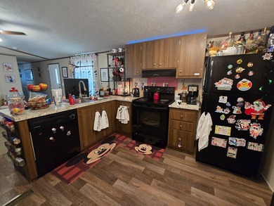 Now offered for sale in the charming Sunset by the Lake - photo 3
