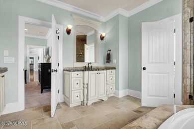 Located on the south end of Figure Eight Island, this stunning