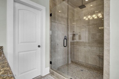 Located on the south end of Figure Eight Island, this stunning