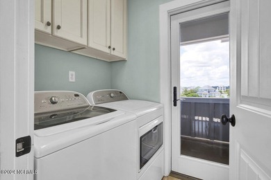 Located on the south end of Figure Eight Island, this stunning