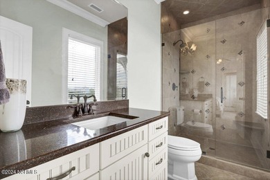 Located on the south end of Figure Eight Island, this stunning