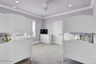 Located on the south end of Figure Eight Island, this stunning