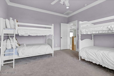 Located on the south end of Figure Eight Island, this stunning